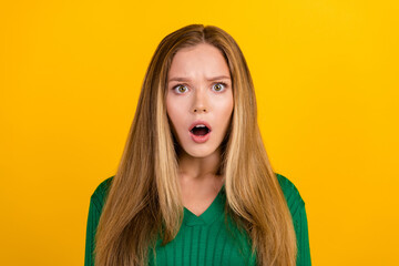 Photo of speechless shocked person open mouth staring cant believe isolated on yellow color...