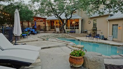 a back yard pool with trees 