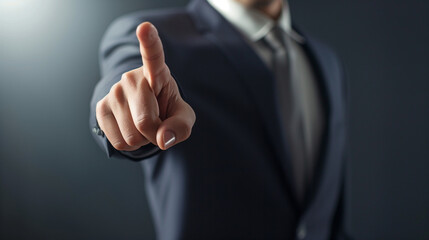 Warning from a Businessman, showing the finger. Advertising concept, a businessman is warning you. Businessman pressing button on a virtual screen