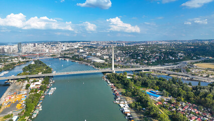 View of Ada Ciganlija from aerial drone and Most na Adi bridge over Sava River. Belgrade - Serbia