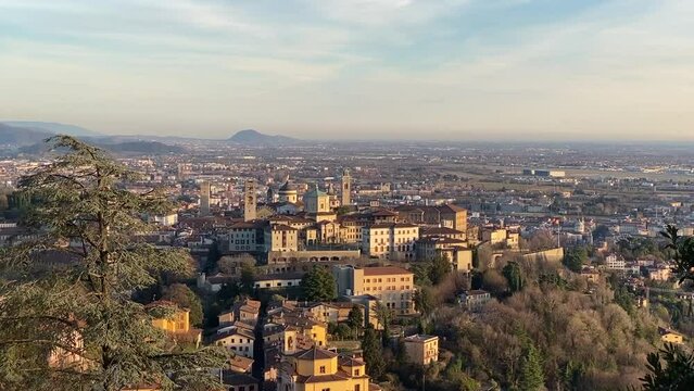 Bergamo Alta, Italy. Aerial view at sunset. - Close-up - Horizontal panning left to right.