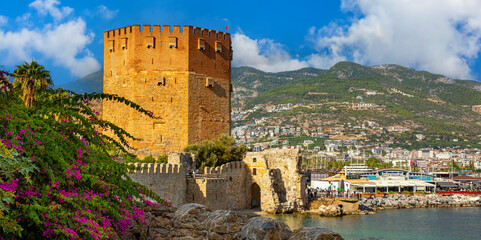 Ancient Red Tower Kizil Kule in port of Alanya, Turkey - Powered by Adobe