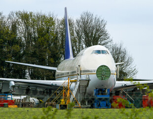 large airplane in the airport scrap yard