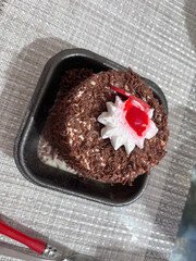 Birthday cake. Cake on the table. Anniversary dessert. Cake with lit candles.