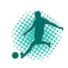 Silhouette of a male soccer player kicking a ball. Silhouette of a football player in action pose.