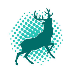 Silhouette of a wild deer forest animal with beautiful antlers. 