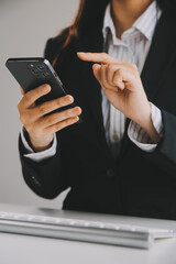 Communication support, call center and customer service help desk. VOIP headset on telephone keyboard.