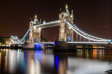 Fototapeta na wymiar Tower Bridge is a Grade I listed combined bascule and suspension bridge in London,