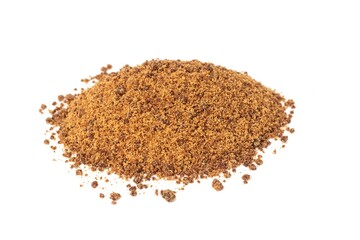 Granulated Sugarcane Jaggery or Indian Gur Isolated on White Background with Copy Space
