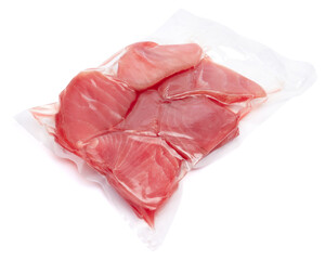 close-up Vacuum packed tuna fillet pieces in transparent plastic for preserving the freshness isolated on white background