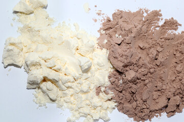 Whey protein has two flavors, chocolate flavor and vanilla flavor. comparison of taste and nutrition of whey protein isolated on white background.