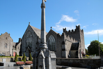 Fountain in front of Holy Trinity Abbey Church in Adare, County Limerick, Ireland  