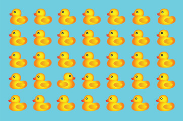Pattern on turquoise background of yellow rubber ducks