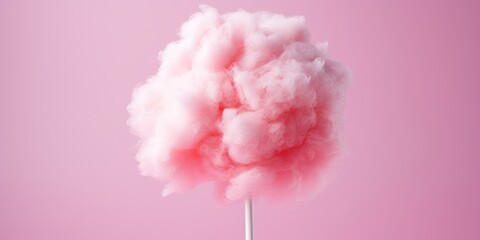A pink candyfloss on the stick food, candy food concept