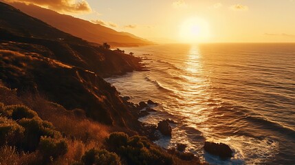 Golden Sunset Over Rugged Coastal Landscape with Waves Crashing on Rocks, Illuminating the Grass-Covered Cliffs