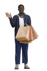 A man in a shirt on a White background with bags in his hands