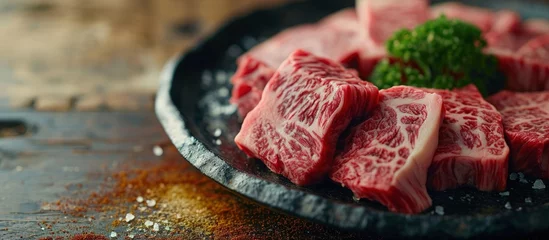 Foto op Plexiglas Japanese Kobe beef for BBQ Japanese Wagyu beef for high quality yakiniku japanese beef slice Marbled Japanese beef used for sukiyaki and shabu Kobe. Creative Banner. Copyspace image © HN Works