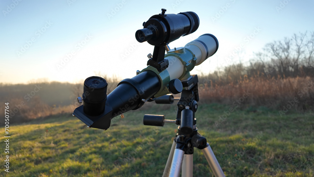 Wall mural astronomical telescope for observing planets, moon, sun, stars, comets and other celestial objects.