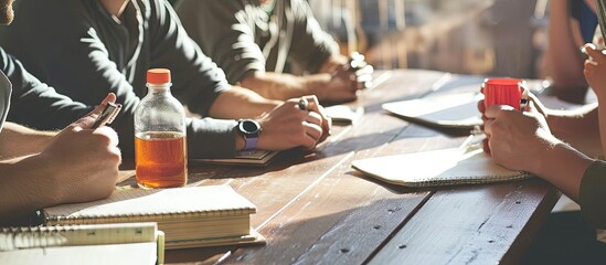 Business meeting time Photo young account managers crew working with new startup project Notebook on wood table Idea presentation analyze plans Wide film effect. Creative Banner. Copyspace image