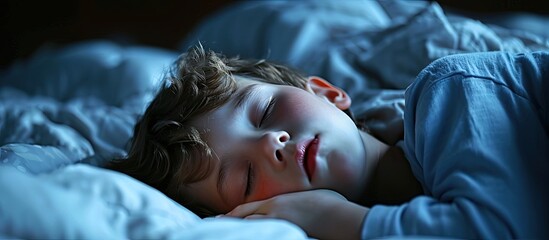 Little boy snoring while sleeping on bed at night. Creative Banner. Copyspace image
