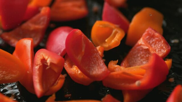 Red hot chili peppers Pan frying Delicious food Slow motion 4K
