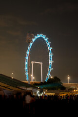 Obraz premium Singapore - June 24 2023: Singapore Flyer Obersavation Wheel Downtown Core District