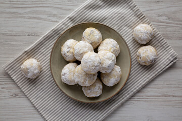 Homemade Snowball Cookies on a Plate, top view. Flat lay, overhead, from above.