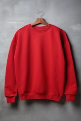 Oversized Red Blank Crewneck Mockup On Concrete Background