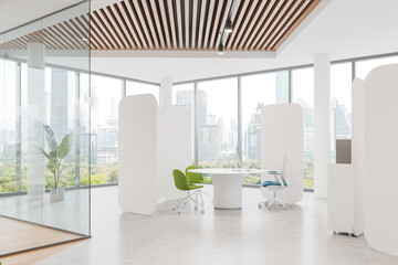 Corner view of office room interior with workspace, chairs and pc desktop