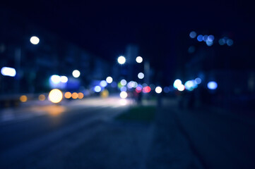 evening city street lights defocused background	
