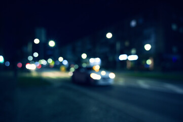 evening city street lights defocused background	
