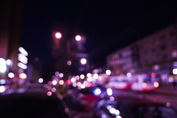evening city street lights defocused background	
