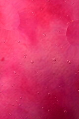 Photo of oil on a water surface with bubbles. .soft pink. Abstract colorful background. Macro...