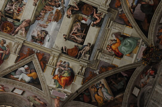 Religious Paintings On The Ceiling Of The Sistine Chapel In Rome Italy