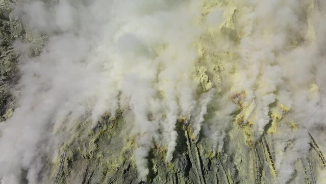drone flight over sulfur mine in Ijen volcano crater