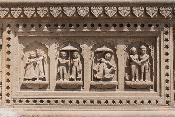 Fototapeta na wymiar Beautiful sculpture or carvings on the wall of Maheshwar temple, Ahilya fort, Maheshwar, Madhya Pradesh, India, Asia.