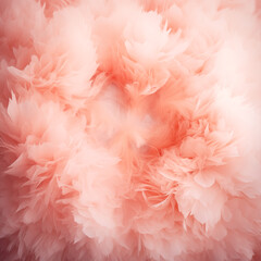 Background with feathers in peach fuzz color