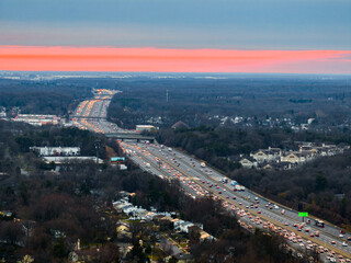 Obraz premium Aerial shot of a busy highway during sunset