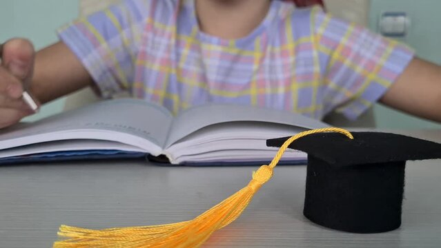 Child does homework and educates himself at home. Development education of children and teenagers