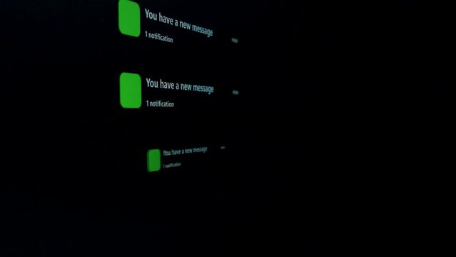 Notification Green Icon of Text Messaging, Online Messaging or E-Mail on Black Device Screen Smart Phone show notifies that there is a new text message. 5G or Wireless technology.