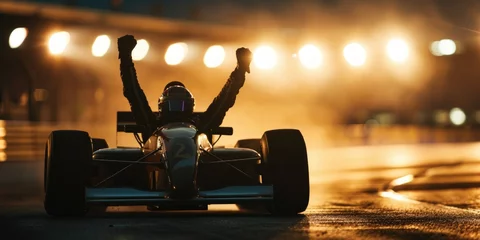 Fototapete winner race car driver celebrating the win in a race against bright stadium lights and confetti. winner competition © YuDwi Studio