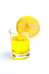 Glass with pure water and lemon on a white background