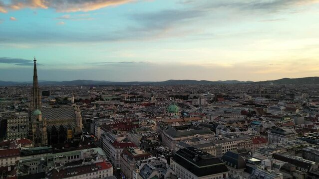 Cathedrals and cityscape City of Vienna, Austria. Roman Catholic Archdiocese of Wien, Vienna aerial skyline view from drone video. Hofburg Palace and heritage buildings in the Historic Centre