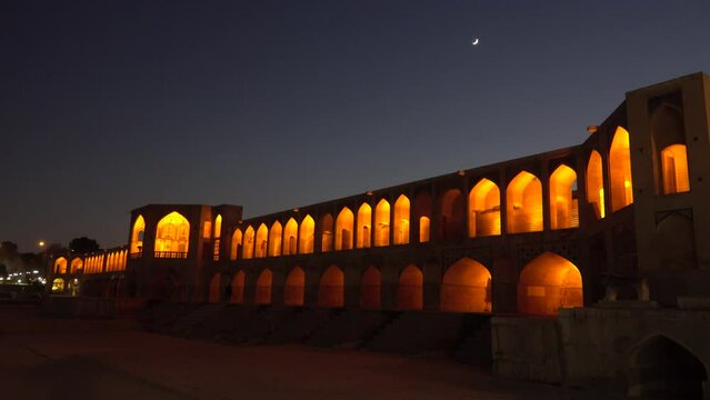 Old Khajoo bridge at night, across the Zayandeh River in Isfahan, Iran.