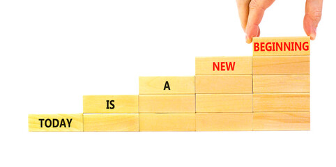 Today is a new beginning symbol. Concept words Today is a new beginning on wooden blocks. Beautiful...