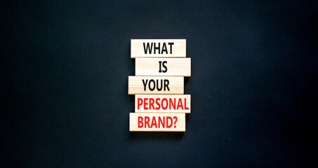 What is your personal brand symbol. Concept words What is your personal brand on wooden blocks. Beautiful black table black background. Business, what is your personal brand concept. Copy space.