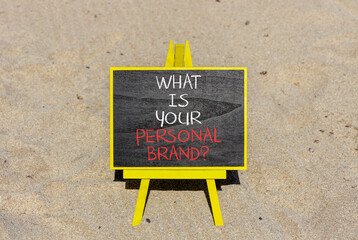 What is your personal brand symbol. Concept words What is your personal brand on beautiful blackboard. Beautiful sand beach background. Business, what is your personal brand concept. Copy space.