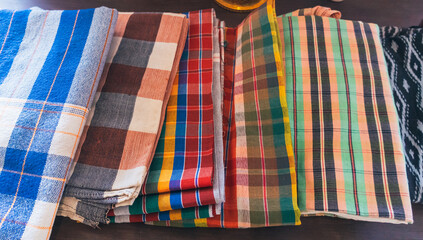 silk colorful loincloth fabric. Pattern from the Thai loincloth,The grid pattern of the loincloth has a unique color.Thai fashion design ,fabric scottish or loincloth pattern red of loincloth