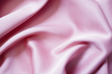 Textured Satin Duchess pink plush draping fabric. Elegant and elegant background. Space for web...