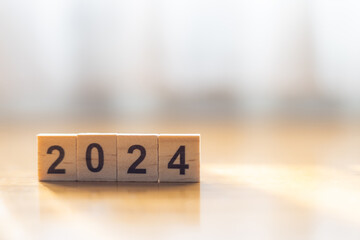 2024 on wooden block on the wood table. Happy New Year 2024. Planning and Goal concept. copy space